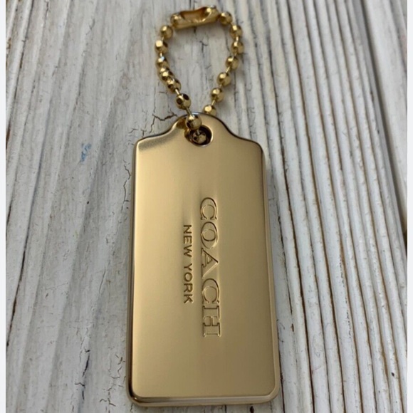 Coach Metallic Gold Tag Keychain - Picture 1 of 9